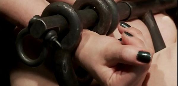  Gagged slut is shackled and caned